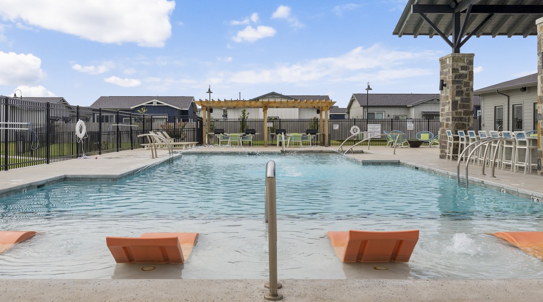 resort style pool with seating