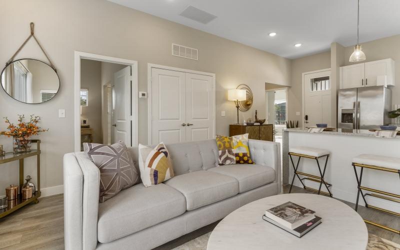 a living room with a couch and a table